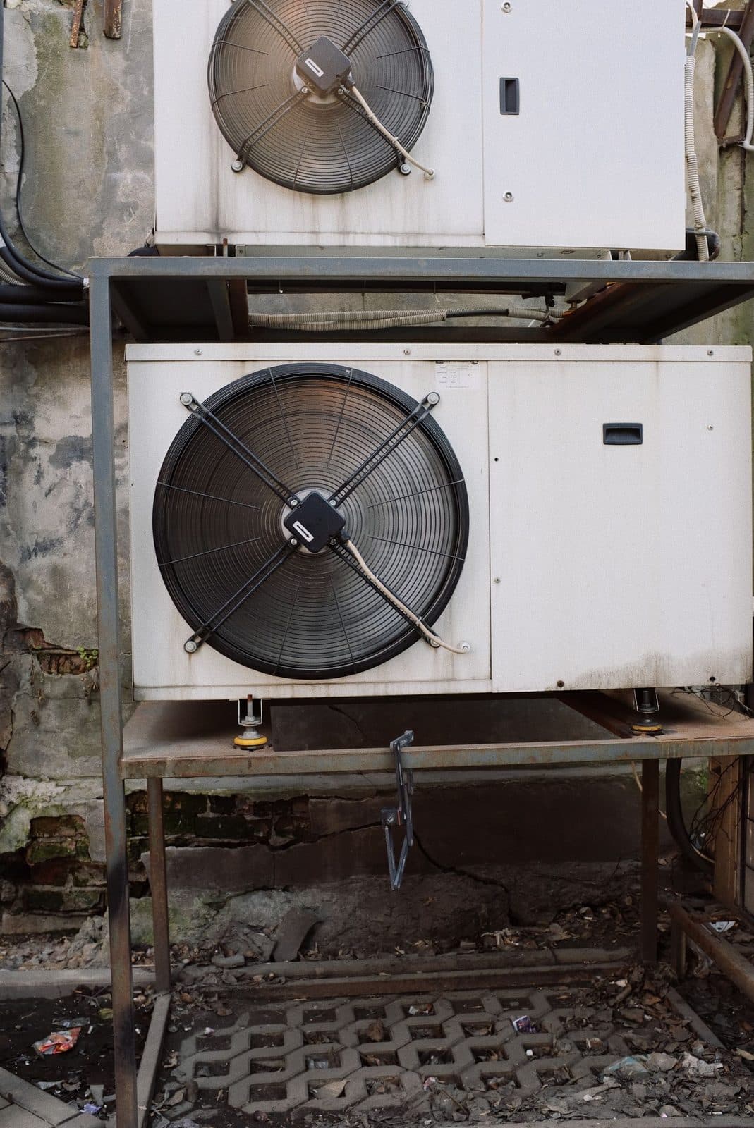Top of an outdoor condenser with the fan grille and coil
